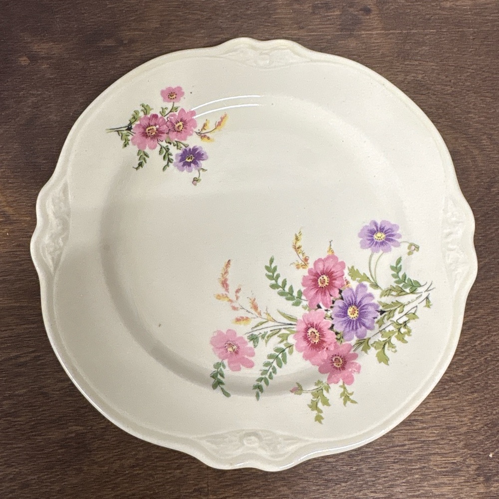 Vintage Homer Laughlin Virginia Rose plate with a pink and purple floral pattern